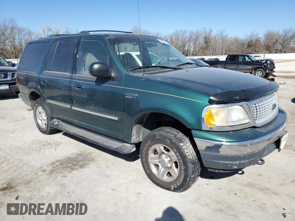 1999 Ford Expedition XLT with VIN 1FMPU18L0XLB96873, listed as a Copart auction lot 46367415 with 161,282 mi miles and Salvage title. Bid and sale history available at DreamBid. Image 4.