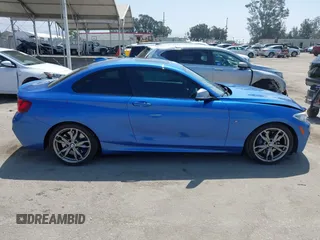 2014 BMW 2 Series M235i with VIN WBA1J7C52EVW84588, listed as a IAAI auction lot 42490194 with 103,998 mi miles and . Bid and sale history available at DreamBid. Image 13.