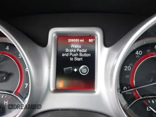 2015 Dodge Journey American Value Pkg with VIN 3C4PDCABXFT637428, listed as a IAAI auction lot 41507850 with 209,050 mi miles. Bid and sale history available at carsss.com. Image 7.