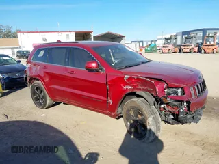 2014 Jeep Grand Cherokee Laredo with VIN 1C4RJEAG3EC519708, listed as a IAAI auction lot 41616364 with 131,184 mi miles. Bid and sale history available at carsss.com. Image 12.