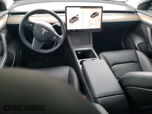 2023 Tesla Model 3 with VIN 5YJ3E1EA7PF395196, listed as a Copart auction lot 51260465 with 41,119 mi miles and Salvage title. Bid and sale history available at DreamBid. Image 8.