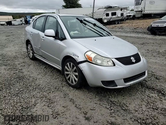2010 Suzuki SX4 with VIN JS2YC5A49A6310256, listed as a Copart auction lot 73210584 with 135,021 mi miles and Salvage Title. Bid and sale history available at DreamBid. Image 11.