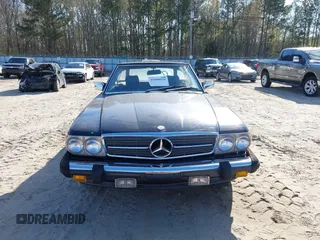 1986 Mercedes-Benz 560 Series 560SL with VIN WDBBA48D2GA055024, listed as a IAAI auction lot 41888928 with 118,569 mi miles. Bid and sale history available at carsss.com. Image 6.