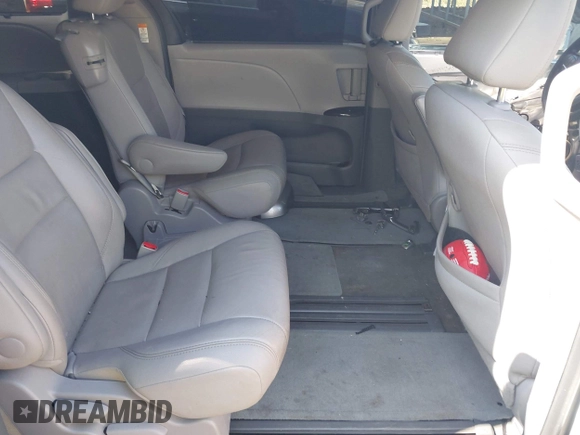 2015 Toyota Sienna XLE with VIN 5TDYK3DC0FS558486, listed as a IAAI auction lot 42064281 with 211,119 mi miles and . Bid and sale history available at DreamBid. Image 8.
