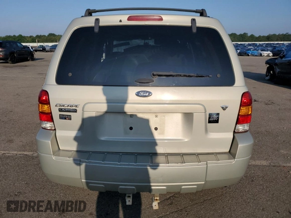 2005 Ford Escape Limited with VIN 1FMYU94195KB35872, listed as a Copart auction lot 63285755 with 145,638 mi miles and Salvage title. Bid and sale history available at DreamBid. Image 6.