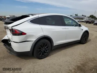 2018 Tesla Model X 75D with VIN 5YJXCAE25JF101432, listed as a Copart auction lot 39950513 with 34879 miles. Bid and sale history available at carsss.com. Image 3.