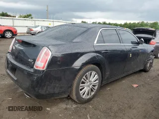 2012 Chrysler 300 C with VIN 2C3CCAKT9CH278272, listed as a Copart auction lot 61398504 with 119,190 mi miles and Salvage Title. Bid and sale history available at DreamBid. Image 3.