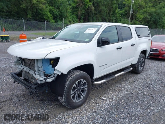 2021 Chevrolet Colorado 4WD Z71 with VIN 1GCGTDEN3M1122062, listed as a IAAI auction lot 42687632 with 52,233 mi miles and . Bid and sale history available at DreamBid. Image 2.