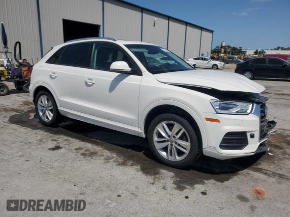 2017 Audi Q3 Premium with VIN WA1BCCFS7HR014683, listed as a Copart auction lot 54739465 with 64,917 mi miles and Salvage title. Bid and sale history available at DreamBid. Image 4.