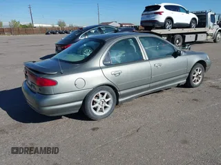 1999 Ford Contour SE Fleet z VIN 1FAFP66L7XK115659, wystawiony jako IAAI lot #42142065 z przebiegiem 161 018 mil mil oraz . Historia ofert i sprzedaży dostępna na DreamBid. Obrazek 4.