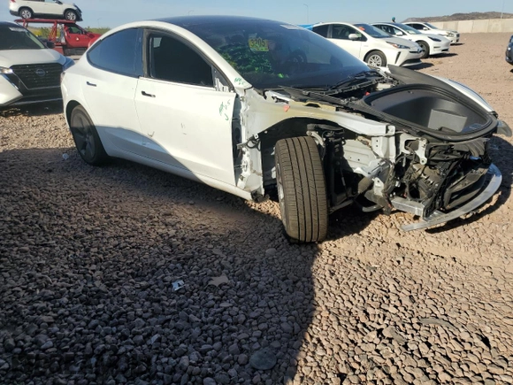 2023 Tesla Model 3 с VIN 5YJ3E1EA3PF512255, выставлен на аукционе Copart как лот 53922155 с пробегом 67 078 миль миль и Списание • Salvage title. История ставок и продаж доступна на DreamBid. Изображение 4.