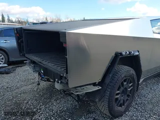 2024 Tesla Cybertruck with VIN 7G2CEHED8RA015749, listed as a IAAI auction lot 41731902 with 13,822 mi miles. Bid and sale history available at carsss.com. Image 6.