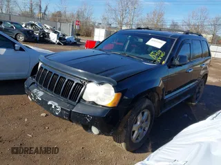 2008 Jeep Grand Cherokee Laredo with VIN 1J8GR48K98C193110, listed as a IAAI auction lot 41833331 with 174,518 mi miles. Bid and sale history available at carsss.com. Image 2.