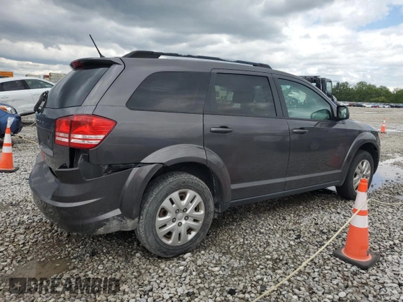 2017 Dodge Journey SE z VIN 3C4PDCAB1HT709104, wystawiony jako Copart lot #57132935 z przebiegiem 89 024 mil mil oraz Szkoda całkowita • Salvage title. Historia ofert i sprzedaży dostępna na DreamBid. Obrazek 3.