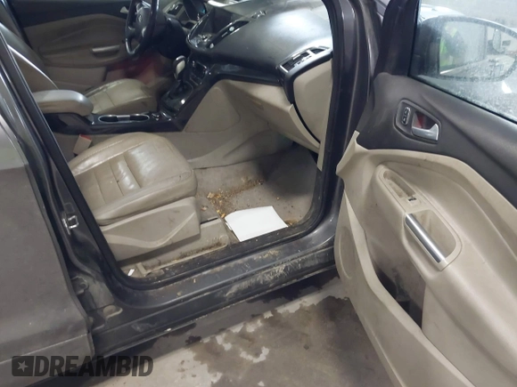 2014 Ford Escape Titanium with VIN 1FMCU9J90EUC31625, listed as a IAAI auction lot 41492075 with 301,917 mi miles and . Bid and sale history available at DreamBid. Image 5.