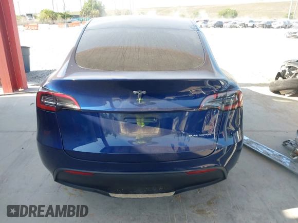 2022 Tesla Model Y Long Range z VIN 7SAYGAEE2NF364733, wystawiony jako IAAI lot #42290231 z przebiegiem 33 907 mil mil oraz . Historia ofert i sprzedaży dostępna na DreamBid. Obrazek 16.