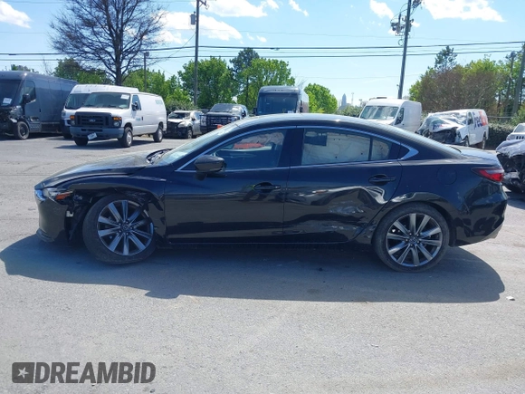 2018 Mazda Mazda6 Touring with VIN JM1GL1VM2J1308743, listed as a IAAI auction lot 41872947 with 125,236 mi miles. Bid and sale history available at carsss.com. Image 14.
