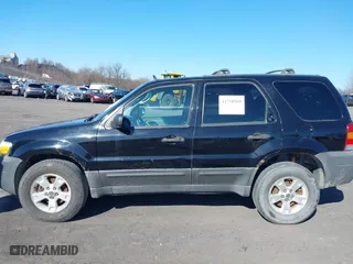 2005 Ford Escape XLT with VIN 1FMYU931X5KB23022, listed as a IAAI auction lot 41758560 with 193,107 mi miles. Bid and sale history available at carsss.com. Image 6.