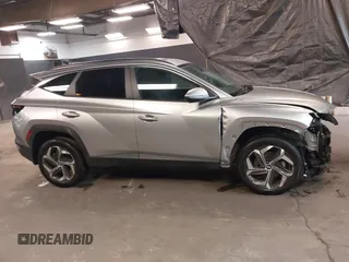 2022 Hyundai Tucson SEL with VIN 5NMJFCAE7NH128788, listed as a IAAI auction lot 40891949 with 21,665 mi miles. Bid and sale history available at carsss.com. Image 14.