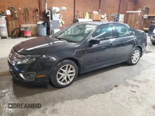 2012 Ford Fusion SEL z VIN 3FAHP0JG2CR434182, wystawiony jako Copart lot #59616065 z przebiegiem 142 122 mil mil oraz Czysty tytuł • Clean title. Historia ofert i sprzedaży dostępna na DreamBid. Obrazek 1.
