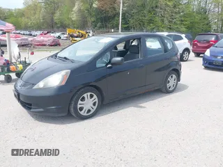 2009 Honda Fit z VIN JHMGE872X9S061071, wystawiony jako IAAI lot #42246291 z przebiegiem 225 991 mil mil oraz . Historia ofert i sprzedaży dostępna na DreamBid. Obrazek 2.
