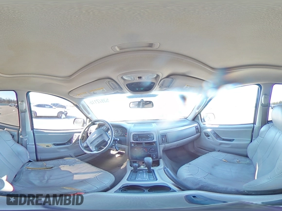 2004 Jeep Grand Cherokee Laredo z VIN 1J4GW48S74C159381, wystawiony jako Copart lot #53972115 z przebiegiem 128 309 mil mil oraz Szkoda całkowita • Salvage title. Historia ofert i sprzedaży dostępna na DreamBid. Obrazek 15.