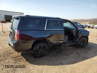 2016 GMC Yukon Denali with VIN 1GKS2CKJ9GR301628, listed as a Copart auction lot 48937035 with 121,863 mi miles and Salvage Title. Bid and sale history available at carsss.com. Image 3.