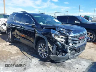 2021 GMC Acadia SLT with VIN 1GKKNML48MZ136091, listed as a IAAI auction lot 40917171 with 71,189 mi miles. Bid and sale history available at carsss.com. Image 1.