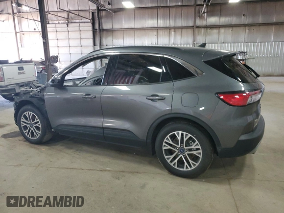 2021 Ford Escape SEL z VIN 1FMCU0H66MUB04206, wystawiony jako Copart lot #56638585 z przebiegiem Nie podano mil oraz Szkoda całkowita • Salvage title. Historia ofert i sprzedaży dostępna na DreamBid. Obrazek 2.