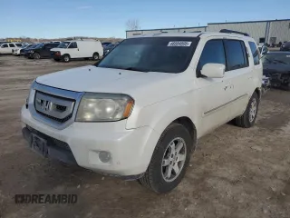 2011 Honda Pilot Touring z VIN 5FNYF3H90BB039570, wystawiony jako Copart lot #46604895 z przebiegiem 249 523 mil mil oraz Czysty tytuł • Clean title. Historia ofert i sprzedaży dostępna na DreamBid. Obrazek 1.