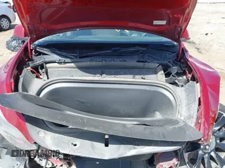 2024 Tesla Model Y Long Range z VIN 7SAYGDEEXRA236065, wystawiony jako IAAI lot #41834658 z przebiegiem 20 313 mil mil oraz . Historia ofert i sprzedaży dostępna na DreamBid. Obrazek 10.