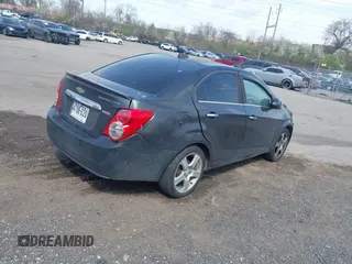 2016 Chevrolet Sonic LTZ z VIN 1G1JE5SB4G4150545, wystawiony jako IAAI lot #41914830 z przebiegiem 166 650 mil mil oraz . Historia ofert i sprzedaży dostępna na DreamBid. Obrazek 4.