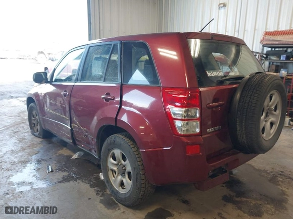 2008 Suzuki Grand Vitara w/Spare & Cargo Covers with VIN JS3TD941084103823, listed as a IAAI auction lot 41670177 with 159,063 mi miles. Bid and sale history available at carsss.com. Image 3.