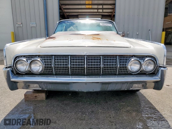 1964 Lincoln Continental z VIN 4Y82N417604, wystawiony jako Copart lot #58056575 z przebiegiem 37 412 mil mil oraz Szkoda całkowita • Salvage title. Historia ofert i sprzedaży dostępna na DreamBid. Obrazek 5.