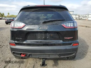 2022 Jeep Cherokee Trailhawk with VIN 1C4PJMBX8ND554044, listed as a Copart auction lot 82687464 with 13,353 mi miles and Salvage Title. Bid and sale history available at carsss.com. Image 6.
