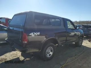 2002 Ford F-150 XL with VIN 1FTRF18232NA58109, listed as a Copart auction lot 79080674 with 148,213 mi miles and Salvage title. Bid and sale history available at DreamBid. Image 3.