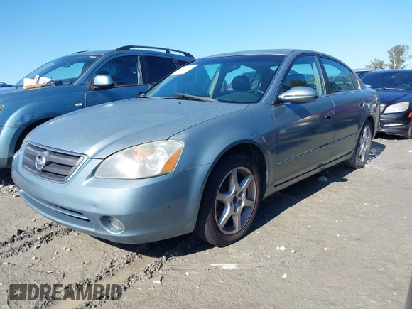2002 Nissan Altima SE with VIN 1N4BL11E22C121586, listed as a IAAI auction lot 41409205 with 213,720 mi miles. Bid and sale history available at carsss.com. Image 2.