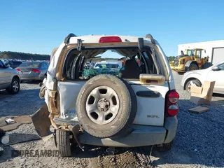 2005 Jeep Liberty Sport with VIN 1J4GK48KX5W679070, listed as a IAAI auction lot 41807899 with 157,726 mi miles. Bid and sale history available at carsss.com. Image 16.