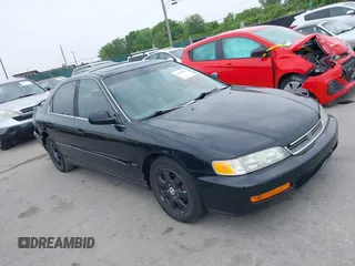 1997 Honda Accord Special Edition with VIN 1HGCD5604VA257140, listed as a IAAI auction lot 42493645 with 148,400 mi miles and . Bid and sale history available at DreamBid. Image 1.