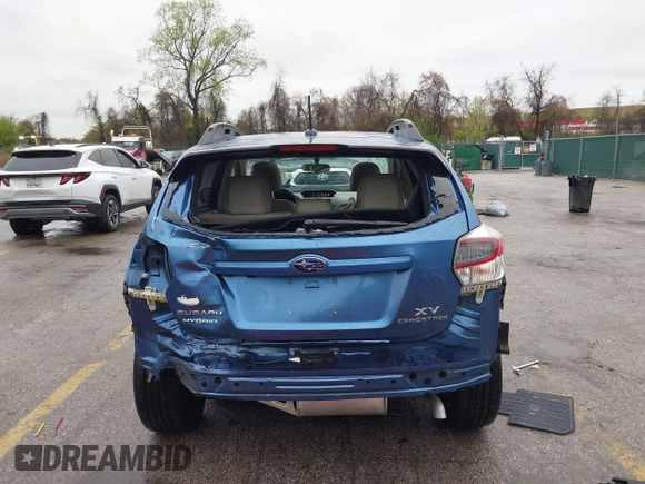 2015 Subaru Crosstrek Touring with VIN JF2GPBPC5FH299227, listed as a IAAI auction lot 41974814 with 45,464 mi miles and . Bid and sale history available at DreamBid. Image 16.