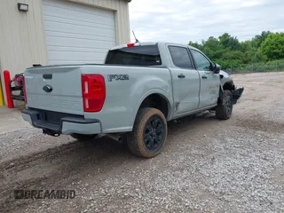 2023 Ford Ranger XL with VIN 1FTER4EH7PLE01037, listed as a IAAI auction lot 42244811 with 36,468 mi miles and . Bid and sale history available at DreamBid. Image 4.