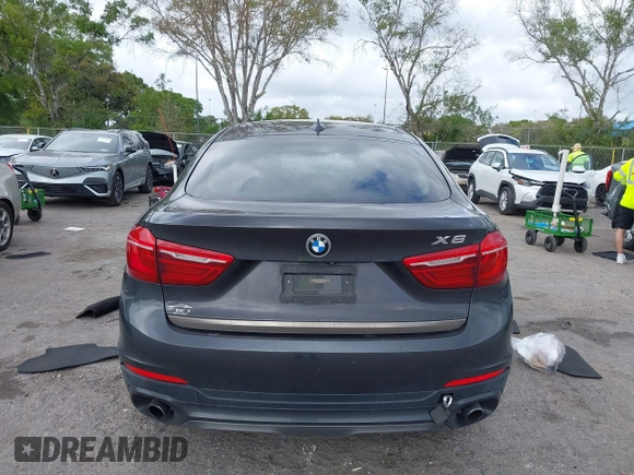 2015 BMW X6 xDrive35i z VIN 5UXKU2C59F0N76242, wystawiony jako IAAI lot #41714644 z przebiegiem 170 851 mil mil oraz . Historia ofert i sprzedaży dostępna na DreamBid. Obrazek 16.