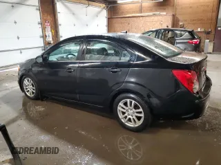 2012 Chevrolet Sonic LT z VIN 1G1JD5SH2C4148200, wystawiony jako Copart lot #74896064 z przebiegiem 104 692 mil mil oraz Szkoda całkowita • Salvage title. Historia ofert i sprzedaży dostępna na DreamBid. Obrazek 2.