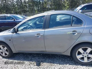 2014 Mitsubishi Lancer SE with VIN JA32V2FWXEU001902, listed as a IAAI auction lot 42116913 with 117,335 mi miles and . Bid and sale history available at carsss.com. Image 15.