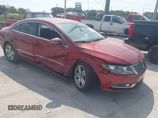 2014 Volkswagen CC R-Line with VIN WVWBP7AN3EE529511, listed as a IAAI auction lot 42213630 with 98,628 mi miles and . Bid and sale history available at DreamBid. Image 1.