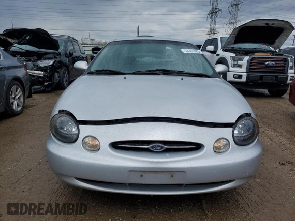 1999 Ford Taurus SE with VIN 1FAFP53U2XA134648, listed as a Copart auction lot 54305325 with 56,794 mi miles and Clean title. Bid and sale history available at DreamBid. Image 5.
