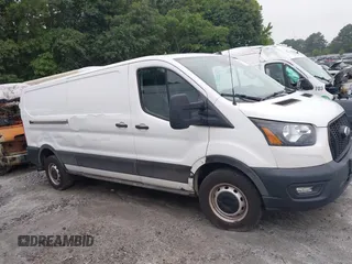 2021 Ford Transit Cargo with VIN 1FTBR1Y83MKA76305, listed as a IAAI auction lot 42240276 with 75,256 mi miles and . Bid and sale history available at DreamBid. Image 13.