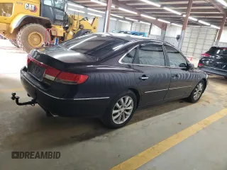 2006 Hyundai Azera SE with VIN KMHFC46F36A096628, listed as a Copart auction lot 61042145 with 229,357 mi miles and Salvage title. Bid and sale history available at DreamBid. Image 3.