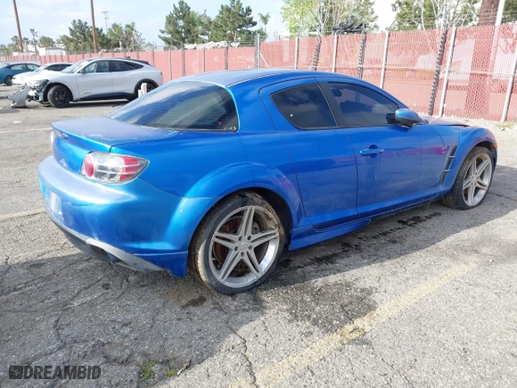 2004 Mazda RX-8 with VIN JM1FE173740125035, listed as a IAAI auction lot 41884059 with 102,881 mi miles. Bid and sale history available at carsss.com. Image 4.