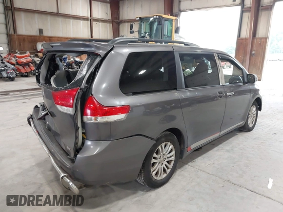 2011 Toyota Sienna XLE AAS with VIN 5TDYK3DC0BS063232, listed as a IAAI auction lot 42433187 with 198,252 mi miles and . Bid and sale history available at DreamBid. Image 4.